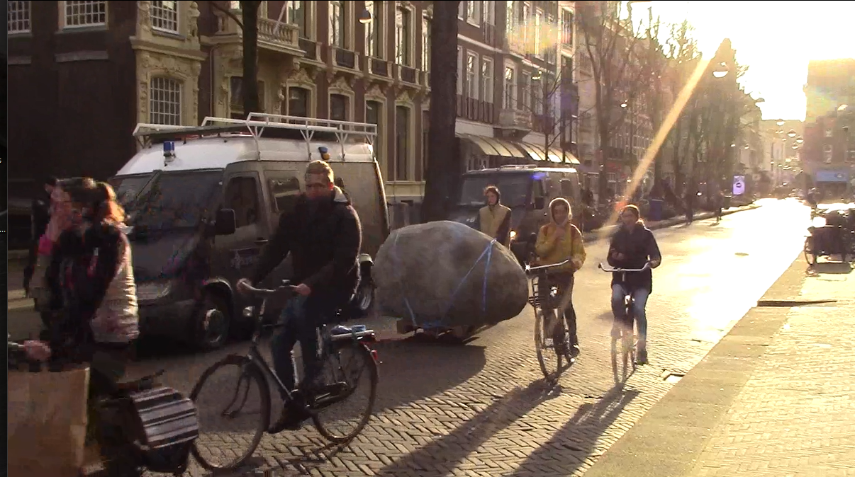 screenshot of video documentation of the tranportation of the rock